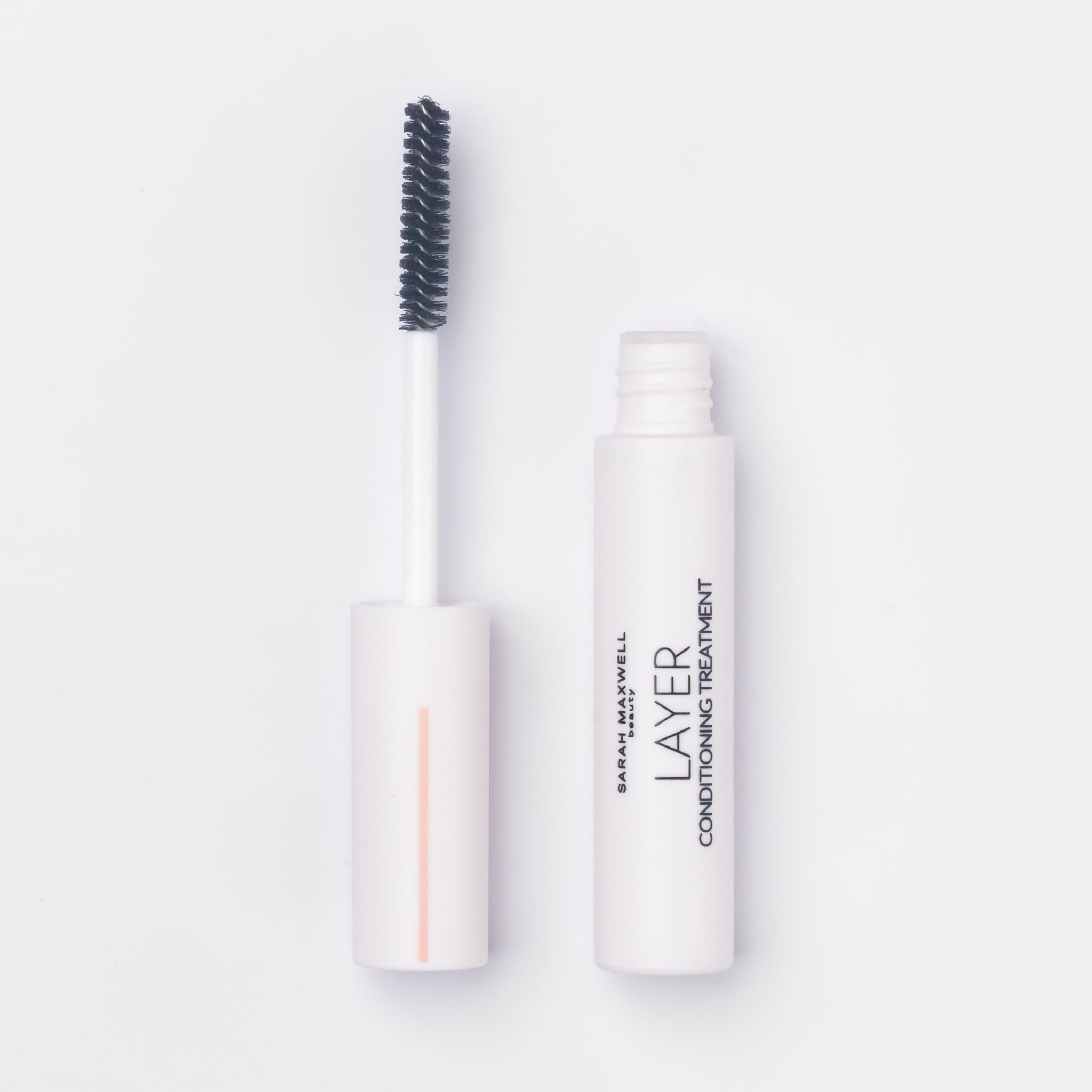 Sarah Maxwell Beauty LAYER Keratin Lash Conditioning Treatment product photo for lashes and brows; sleek luxury beauty packaging, clean minimalist aesthetic.